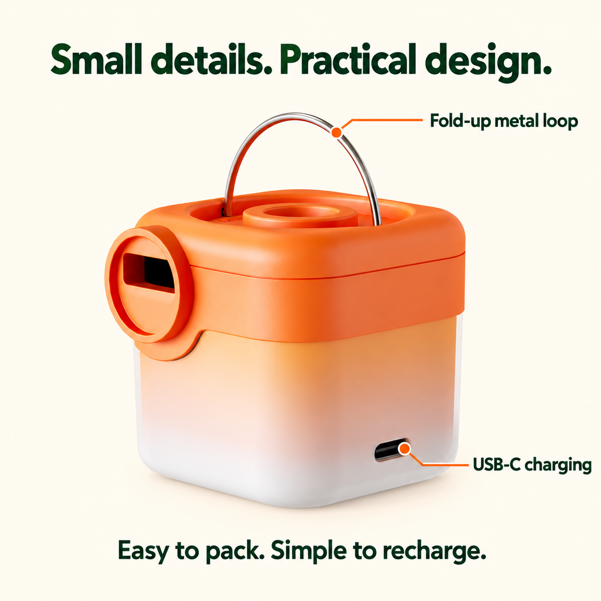 Orange mini air pump detail showing USB-C charging port and fold-up metal loop