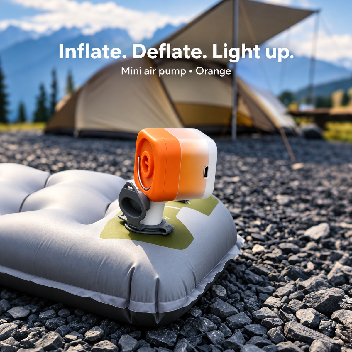 Orange portable air pump connected to a compatible camping mattress valve; mattress and tent are scene props